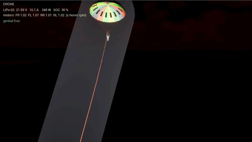 Die Drohne kreist um den Parasail, die Leinen laufen zum Joch, der Pilot hängt im Brustgurt